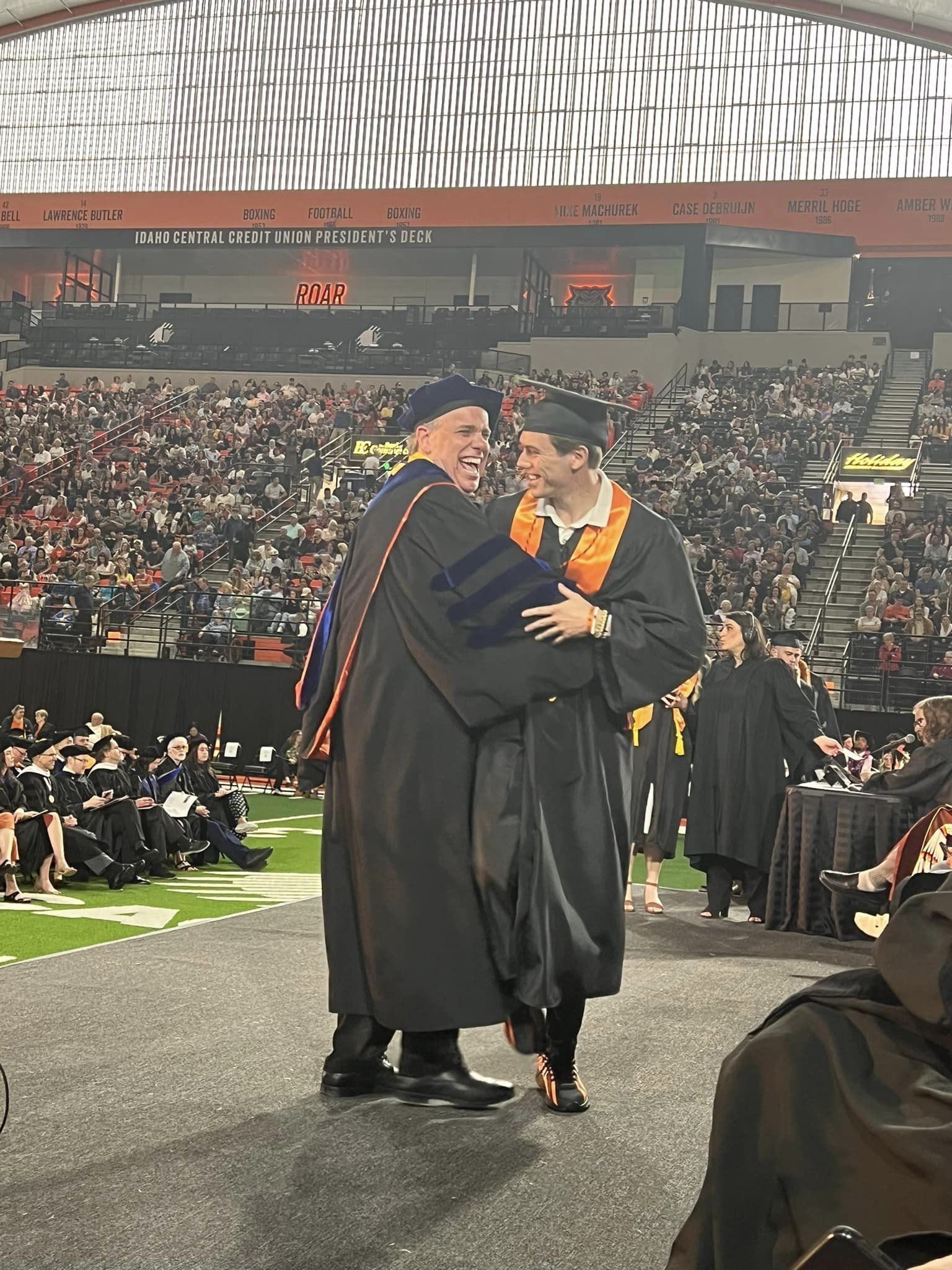 Dr. Hunt congratulates son Andrew on his graduation from Idaho State University, 2024